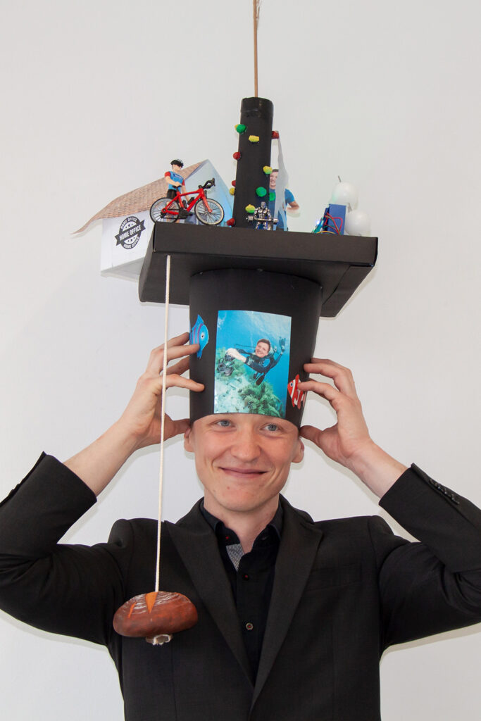 Mann mit Doktorhut